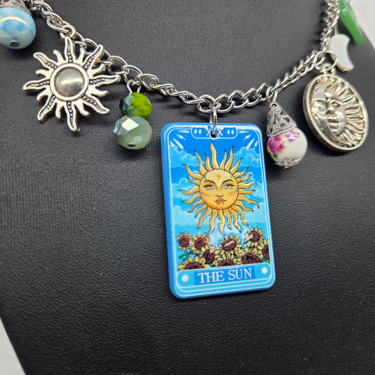 Third view of the 20 inch Sun charm necklace by The Velvet Viper