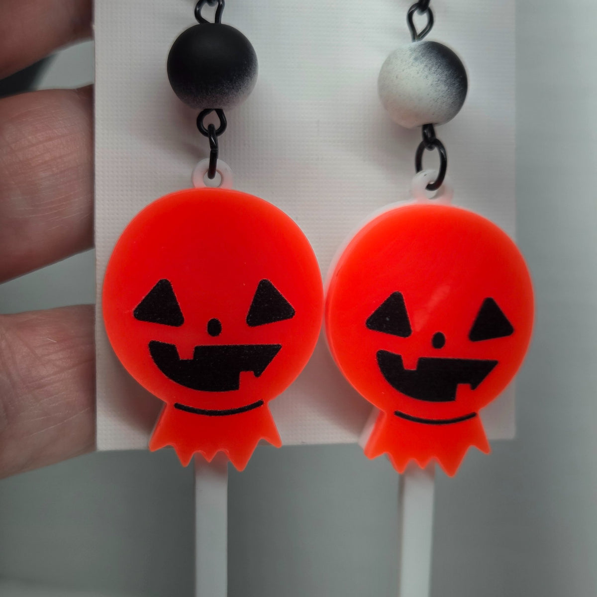 Second view of the autumn pumpkin lollipop earrings by The Velvet Viper
