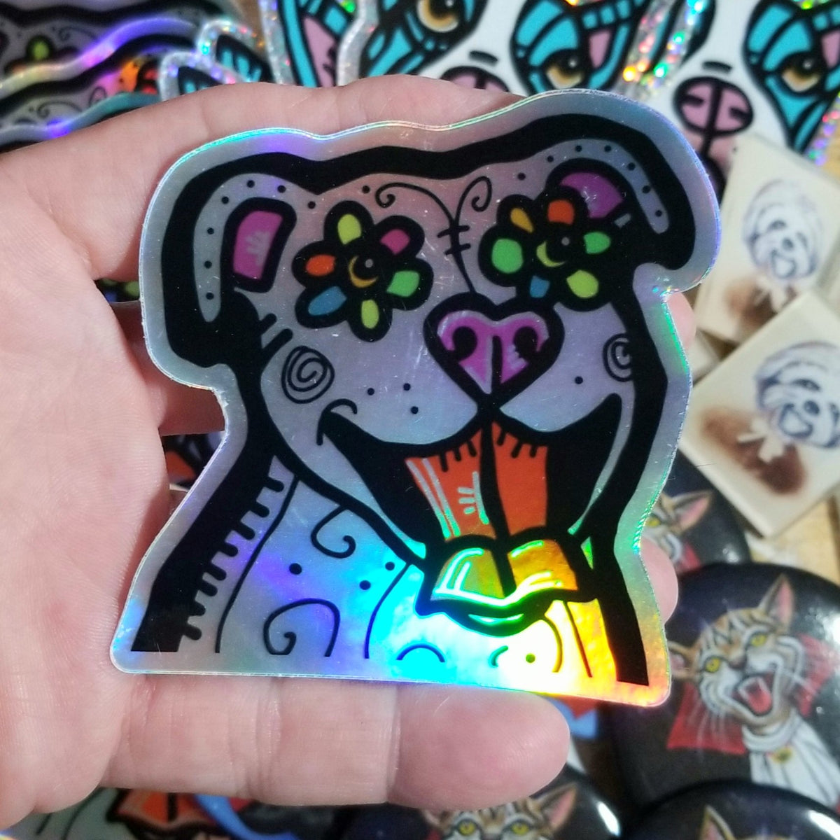 Holographic vinyl sticker of a Day of the Dead sugar skull dog by Michele The Painter
