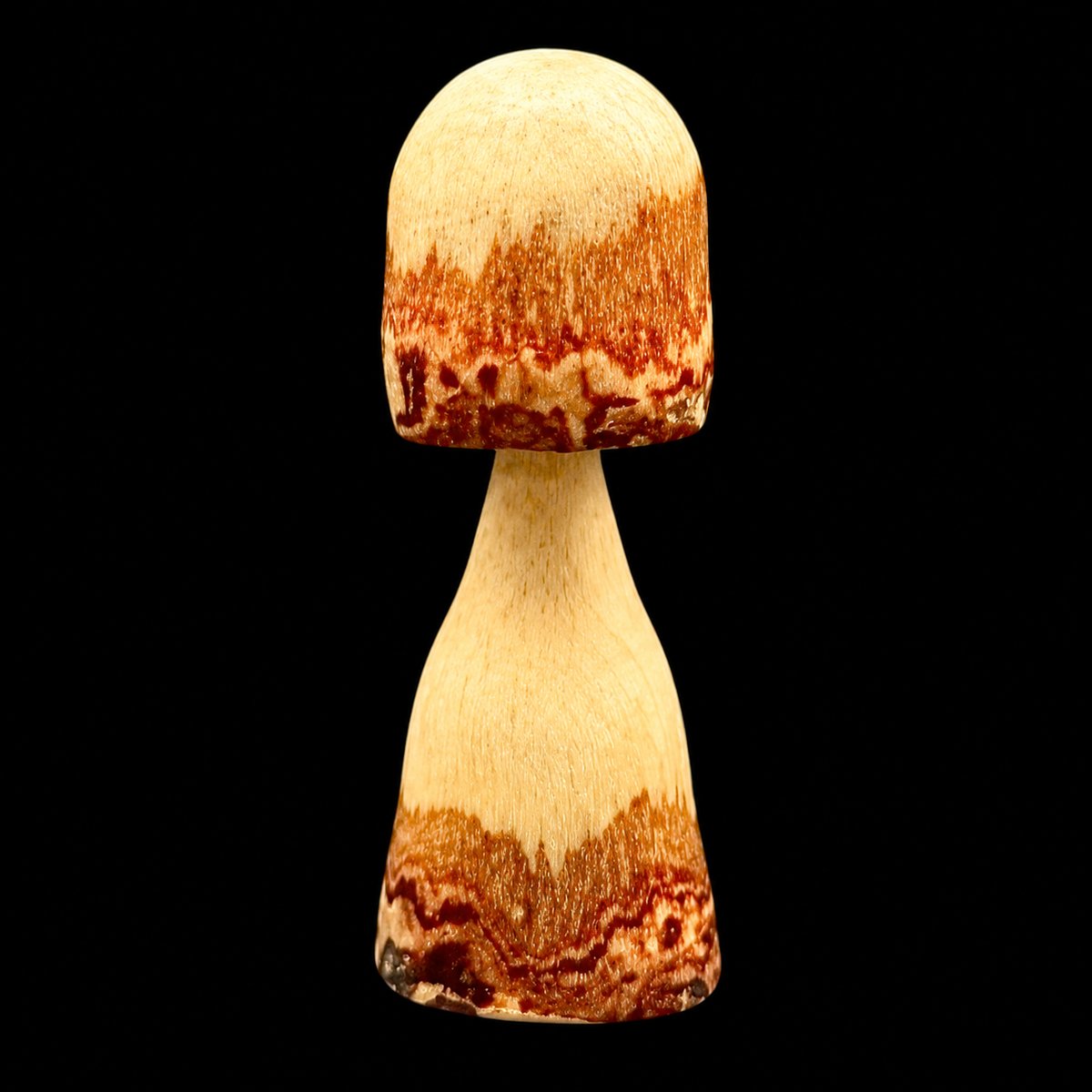 Second view of the 2.5 inch carved holly mushroom from Sawdust Heaven