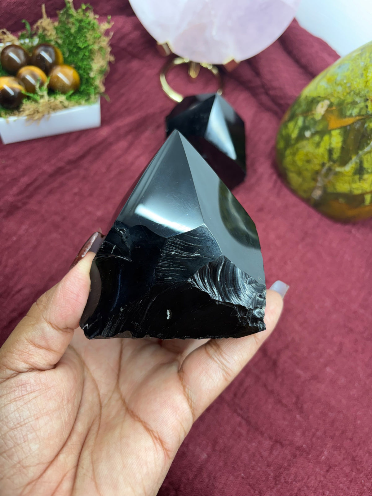 Further view of the black obsidian crystal offered by Holistic Unicorn