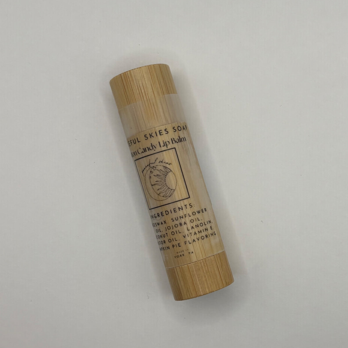 Cotton candy scented beeswax lip balm in a bamboo container by Peaceful Skies