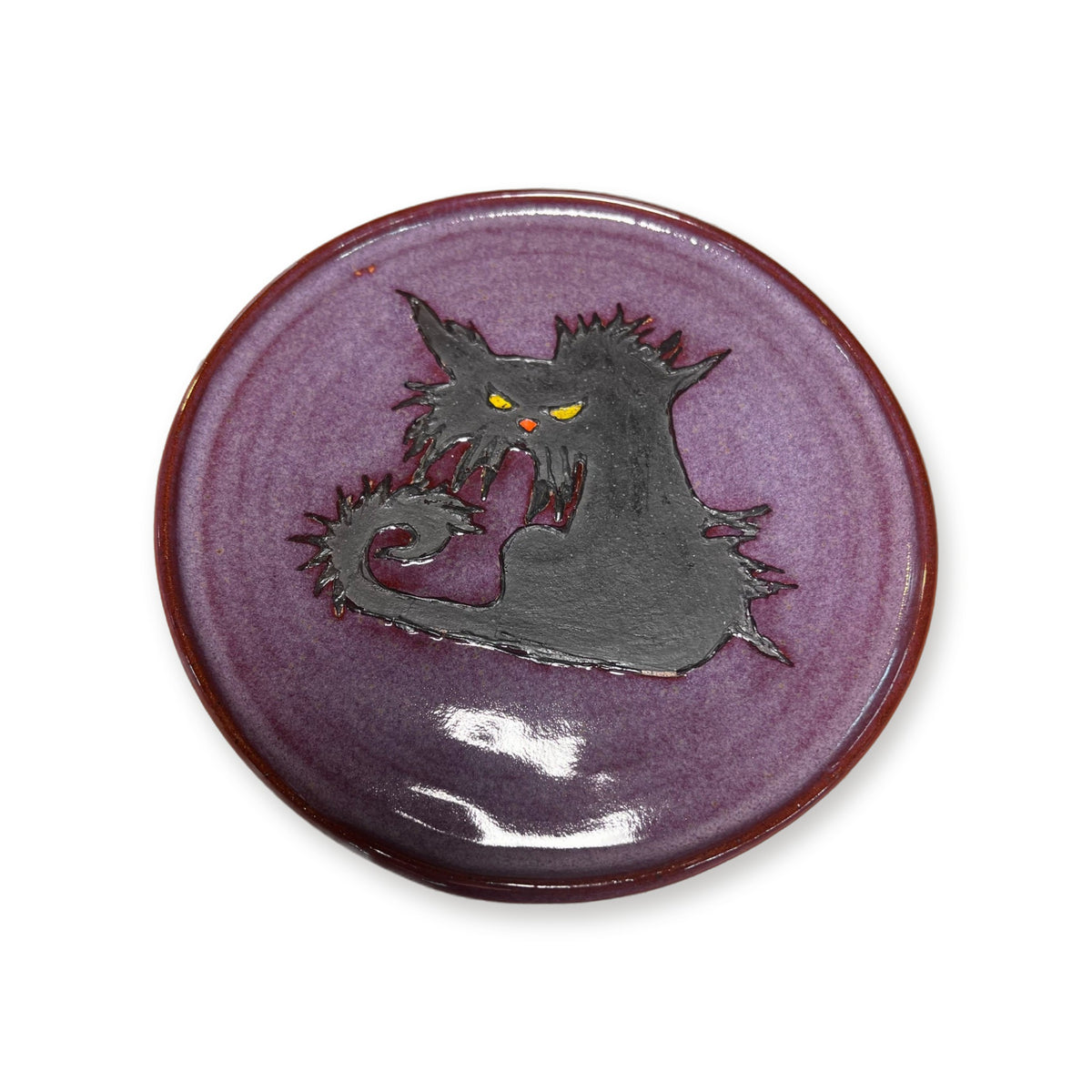 Handmade purple ceramic Halloween plate with hand-painted gray scaredy cat with yellow eyes by ABeYOUtifulMind