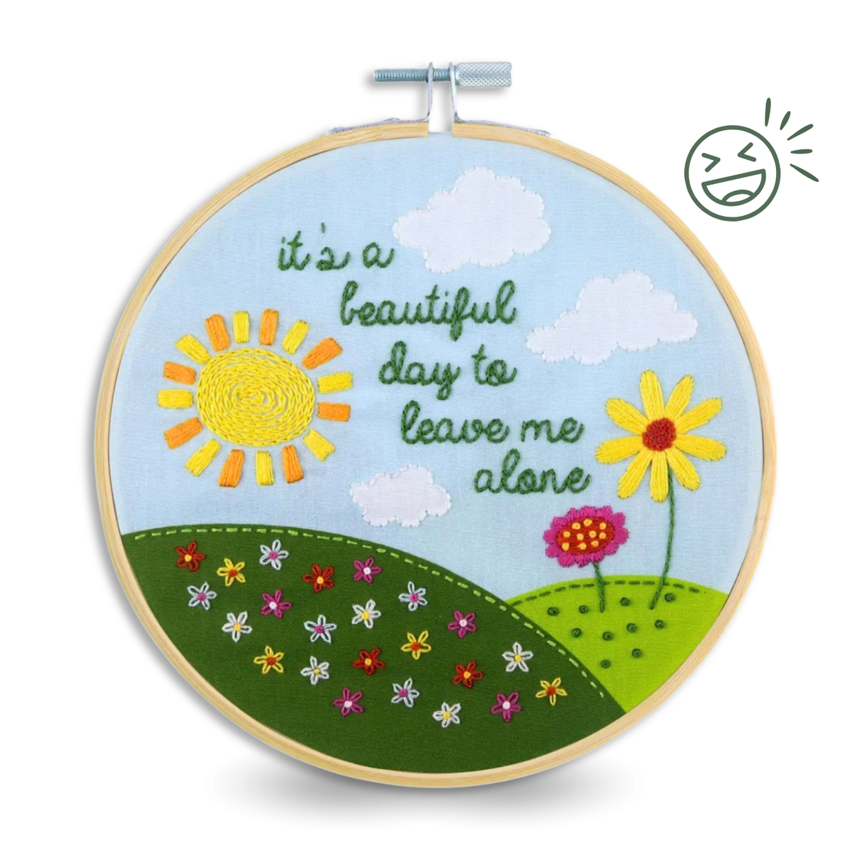 Embroidery hoop with sun, flowers and text It's A Beautiful Day To Leave Me Alone