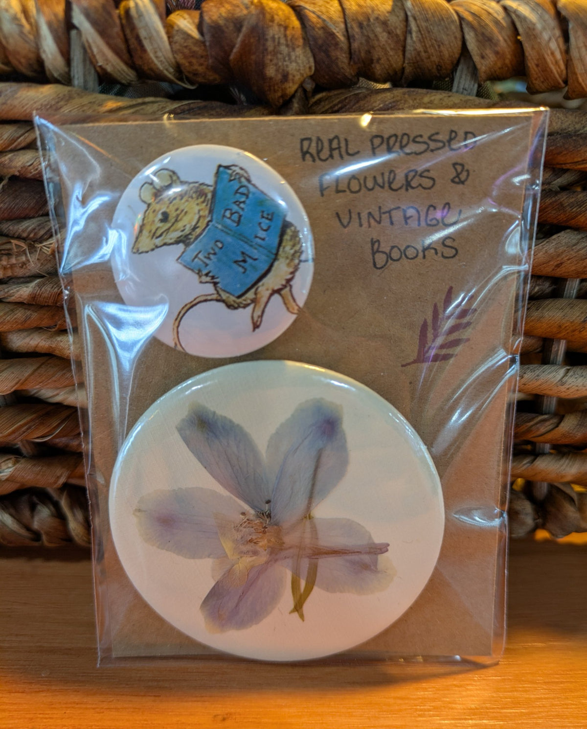Further view of the pressed flower and vintage gardening magazine pins by Jaimee Crash Art