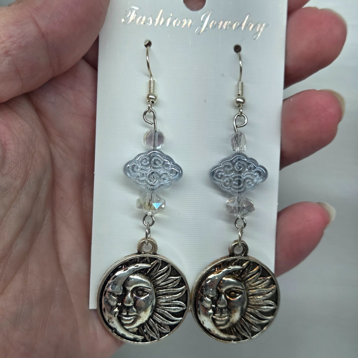 Celestial Stunner earrings set with crystal beads that catch the light, by The Velvet Viper
