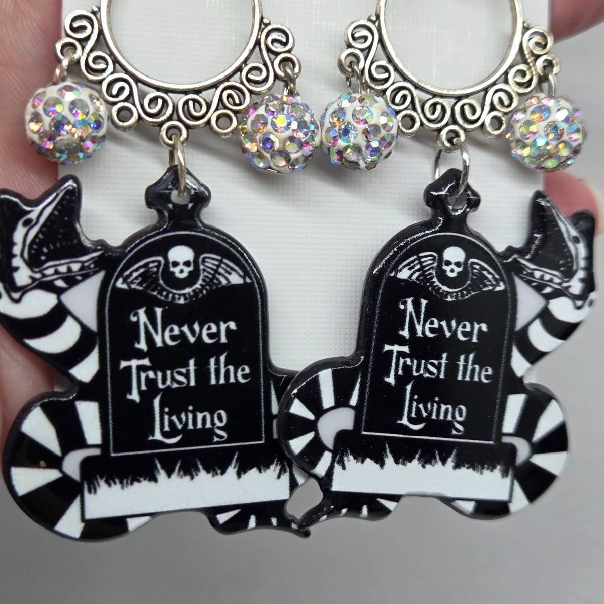Second view of the lightweight sandworm Halloween earrings from The Velvet Viper