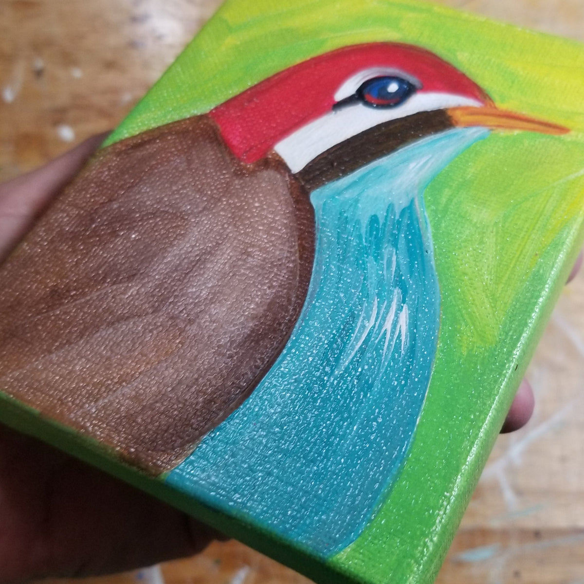 Third view of the red headed brown bird original from Michele The Painter