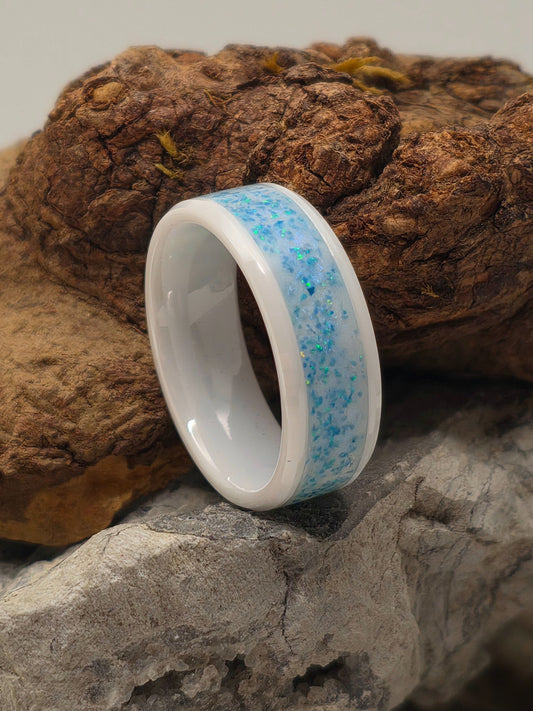 White ceramic ring with light mosaic Pacific sapphire opal inlay by Cameron Senft Designs, size 10