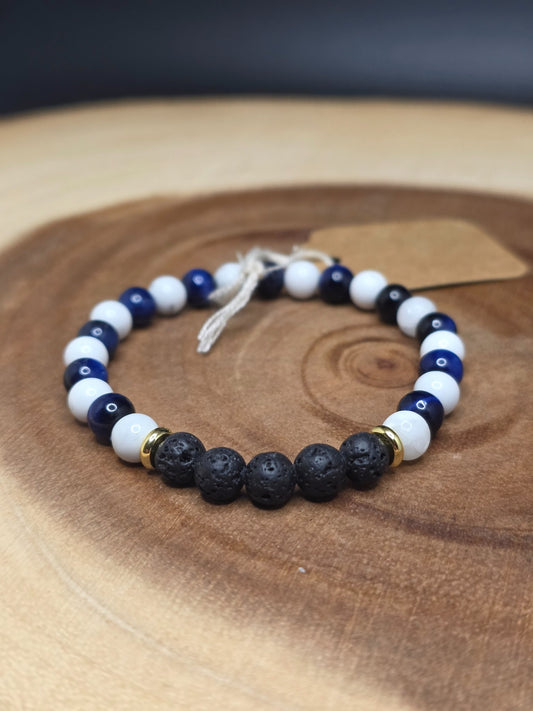 Howlite, dark blue tiger's eye and lava rock beaded bracelet with gold-plated spacers by Cameron Senft Designs