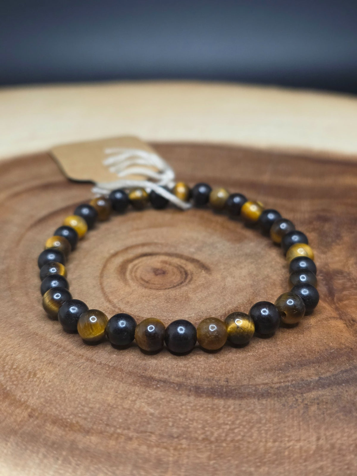 Golden tiger's eye and ebony wood beaded stretch bracelet by Cameron Senft Designs, medium size