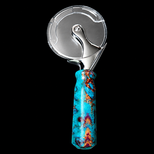 Pizza cutter with a Lagoon Treasure acrylic handle in turquoise and coppery tones by Sawdust Heaven