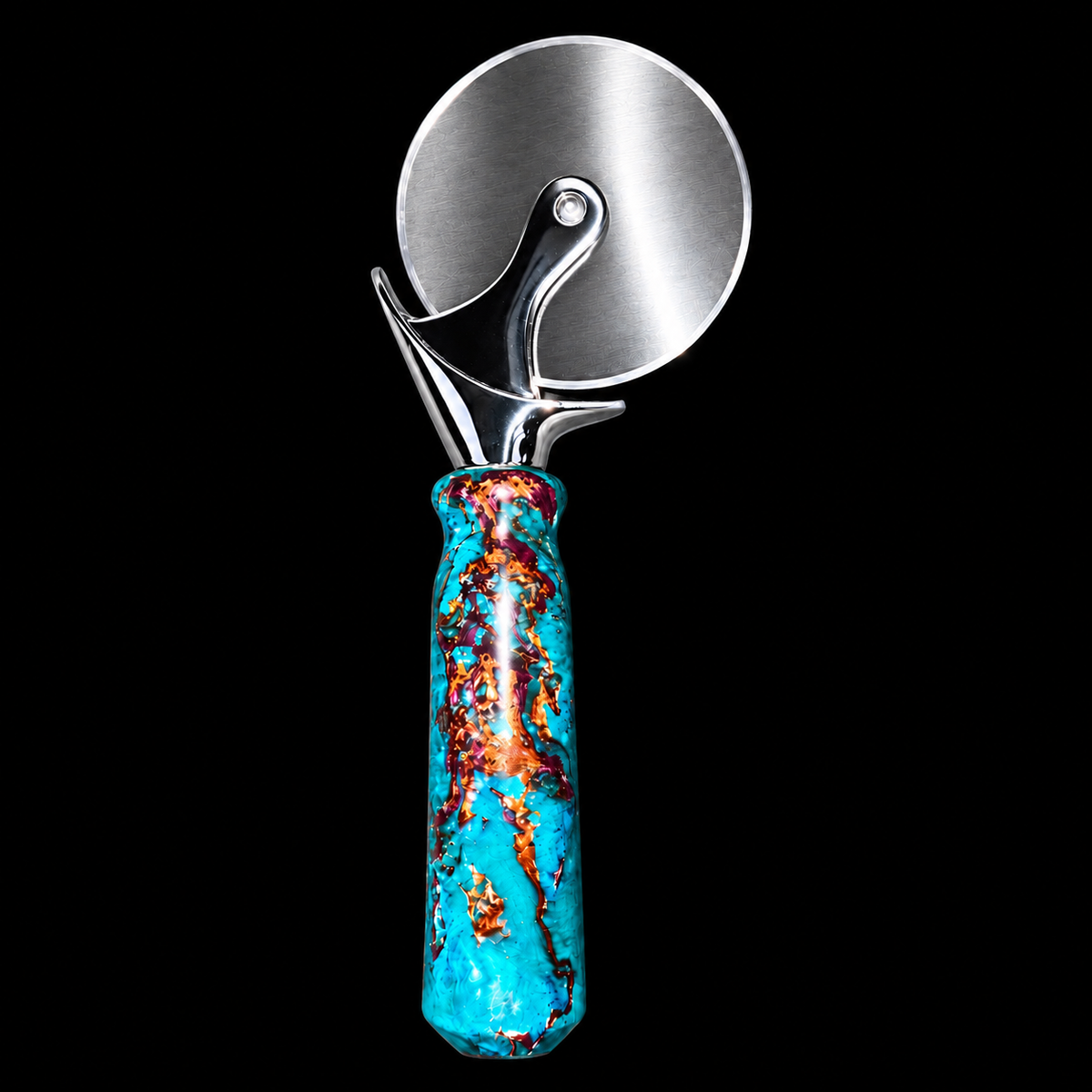 Second view of the Lagoon Treasure pizza cutter, 10 inches end to end