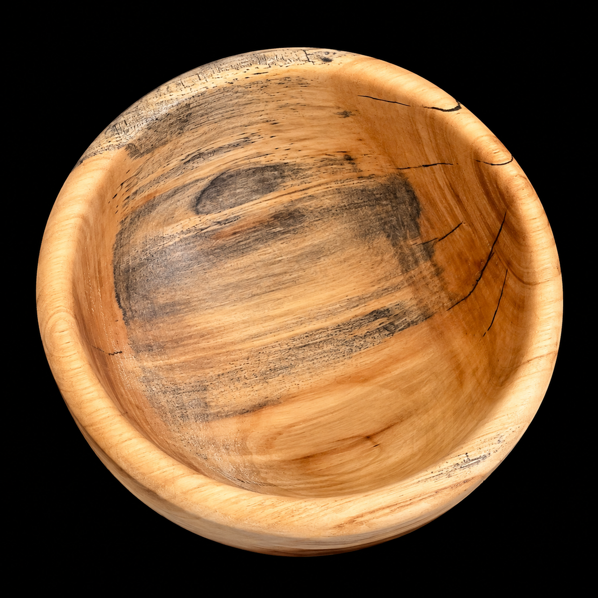 Third view of the poplar bowl showing its dramatic mineral streaking