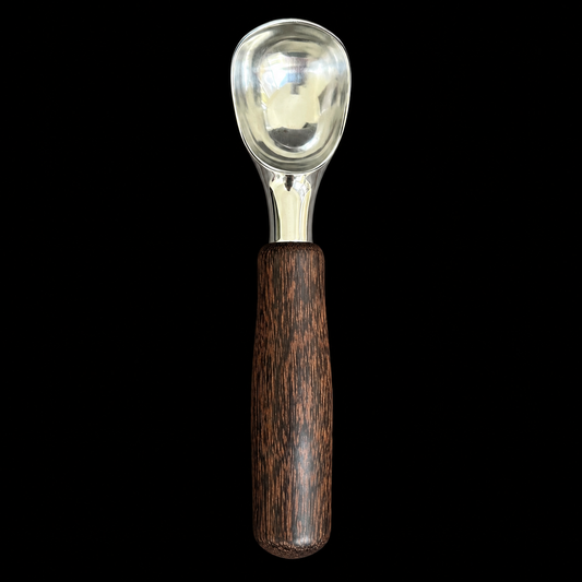 Large black palm ice cream scoop with high-contrast speckled grain by Sawdust Heaven