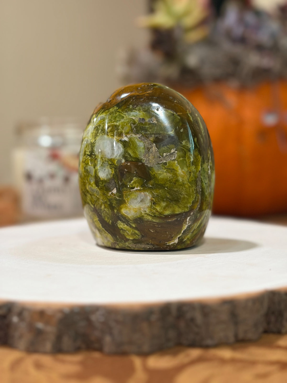 Second view of the Madagascar green opal showing its lime and reddish brown veins