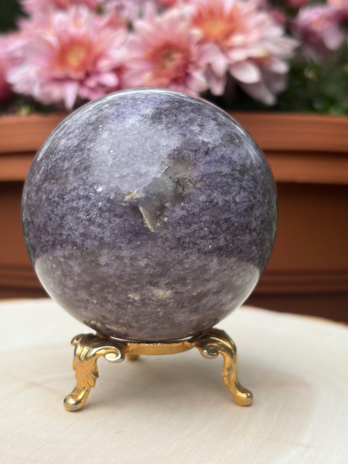 Second view of the lepidolite sphere and its gold display stand