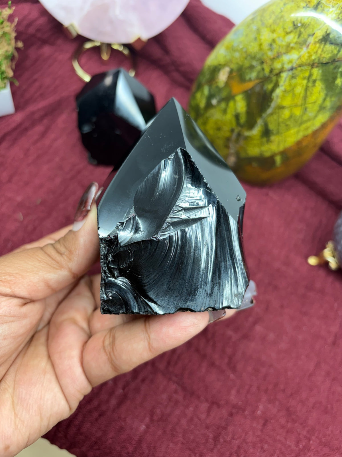 Black obsidian specimen, a protective volcanic stone for grounding, from Holistic Unicorn