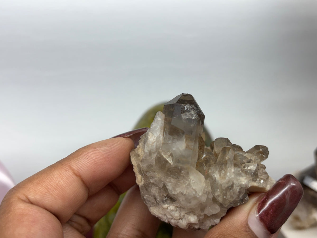 Further view of this smokey quartz cluster showing its natural crystal formation