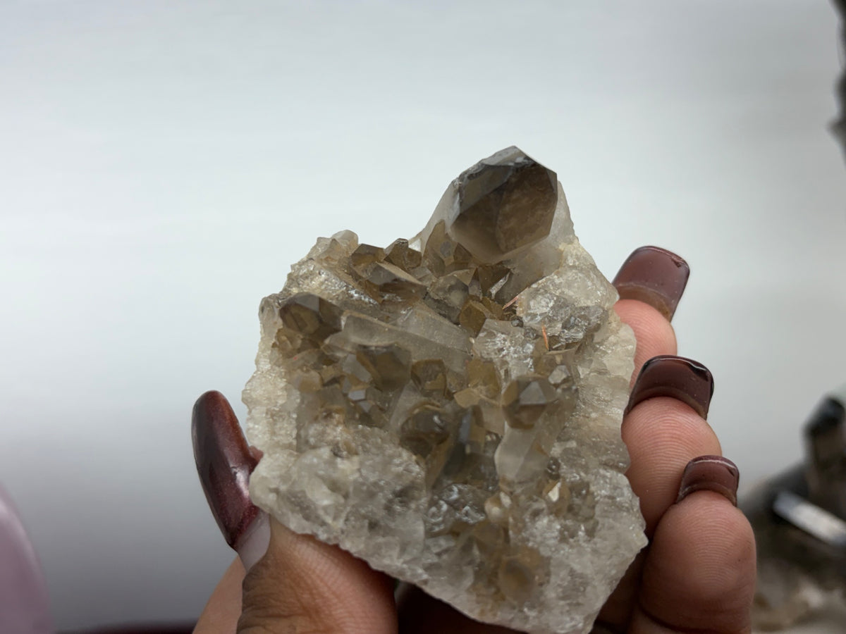 Another angle of the smokey quartz cluster point offered by Holistic Unicorn