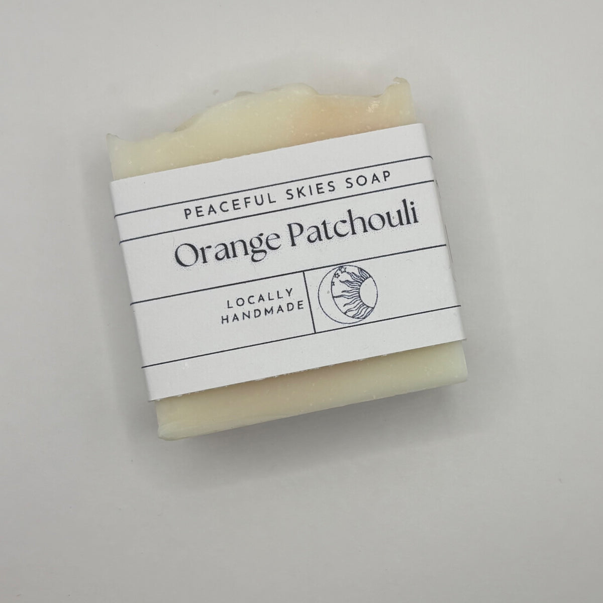 Handmade four ounce bar of orange patchouli soap by Peaceful Skies of York, Pennsylvania