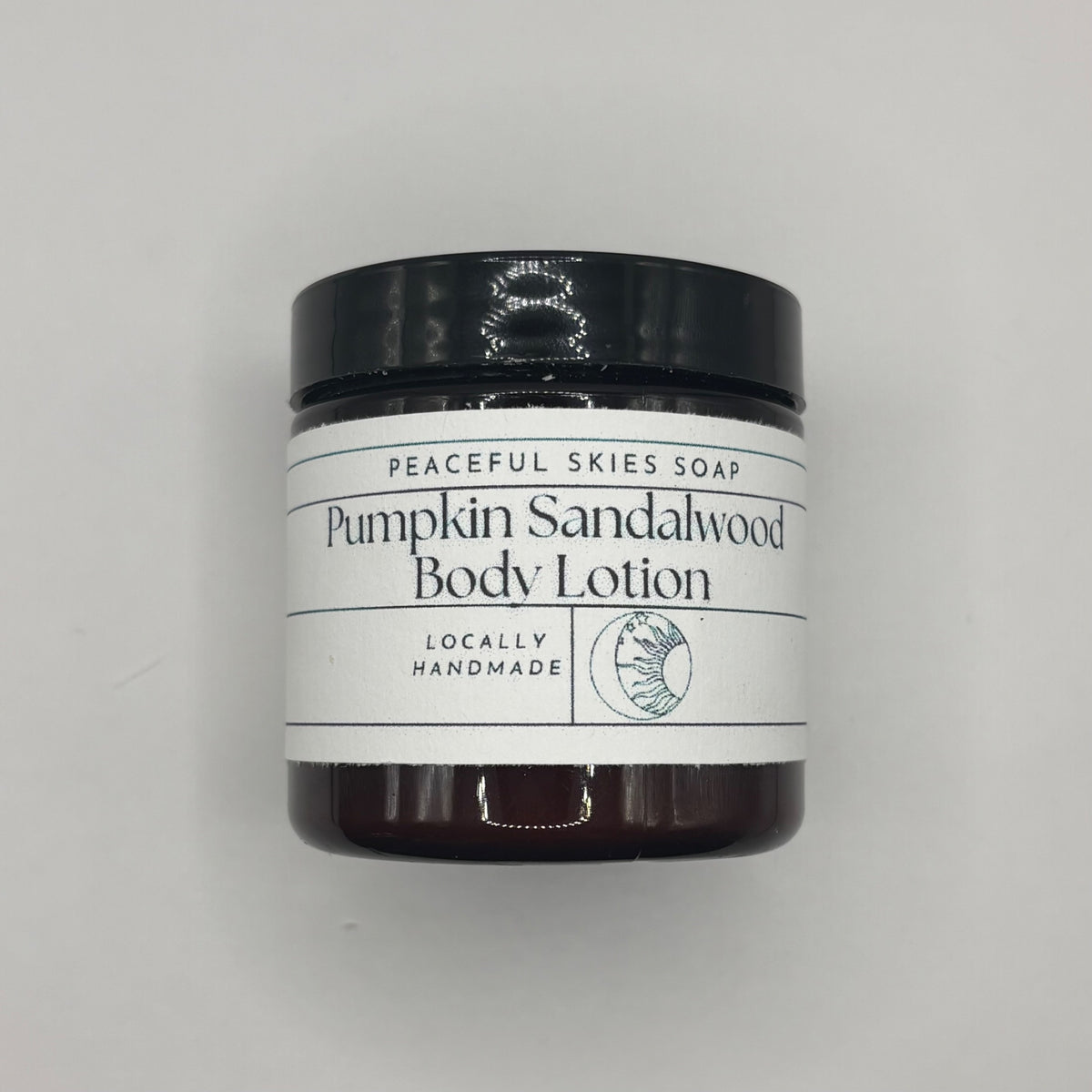 Bottle of pumpkin sandalwood body lotion handcrafted in York, Pennsylvania by Peaceful Skies