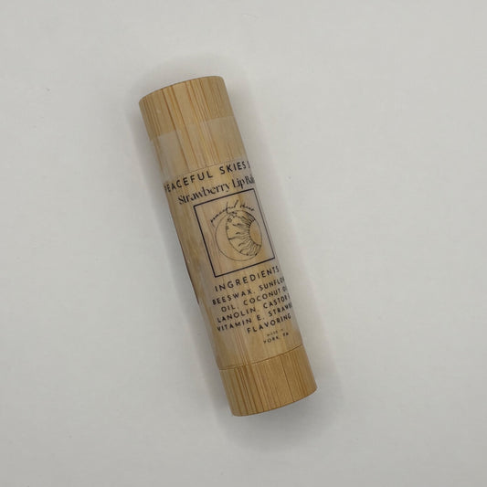 Strawberry beeswax lip balm in a bamboo container by Peaceful Skies of York