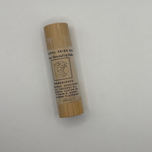 Honey almond beeswax lip balm in a natural bamboo container from Peaceful Skies