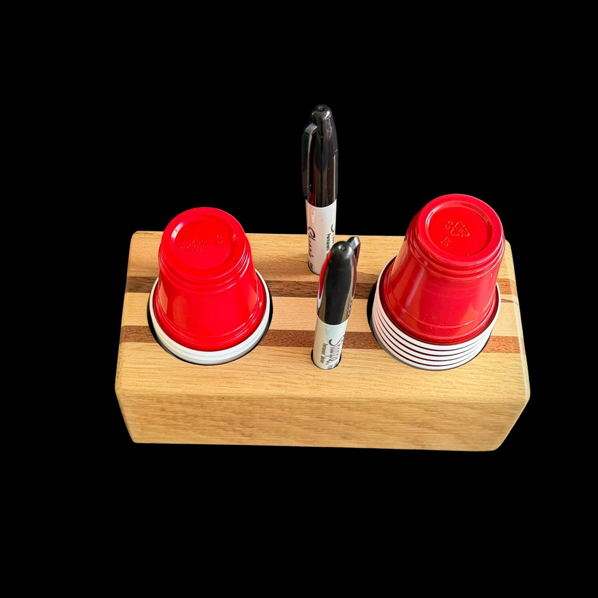 Shot cup holder for 2 ounce cups, handmade from oak, mahogany and walnut by Sawdust Heaven