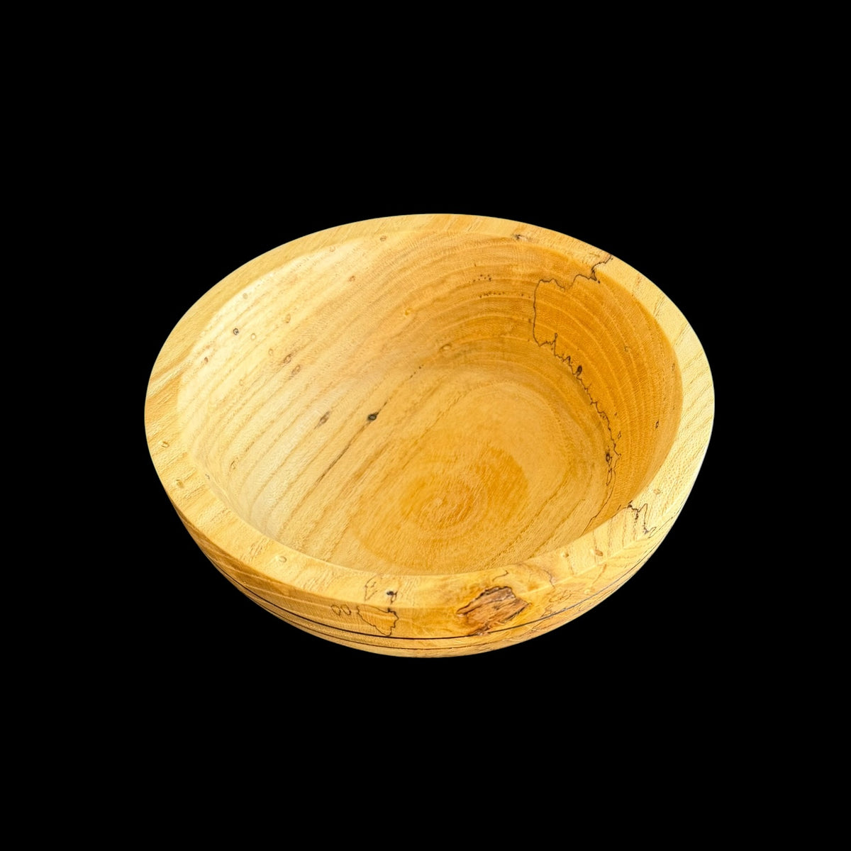 Second view of the spalted maple bowl showing its natural grain patterning