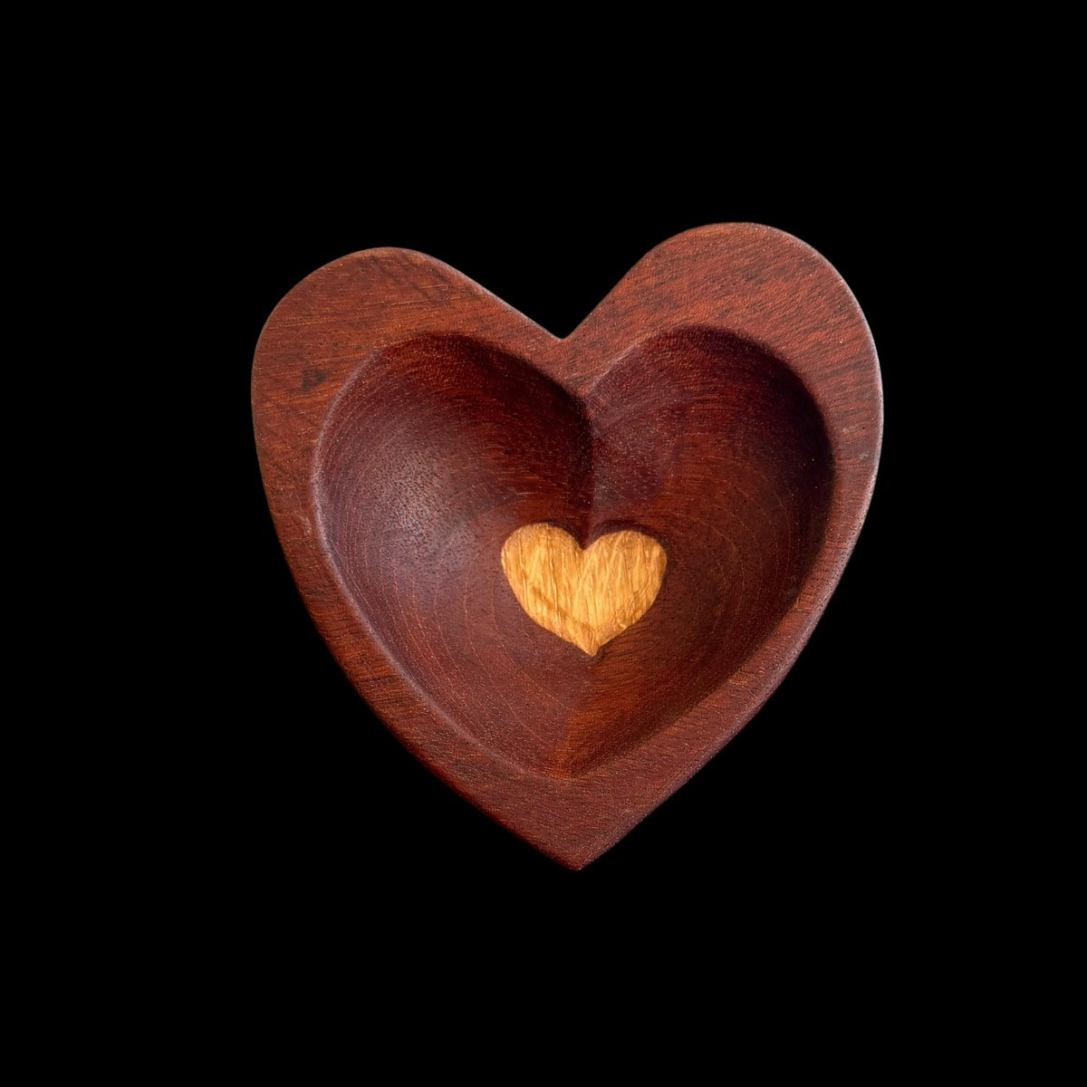 Two-tone mahogany and oak heart dish with a hidden oak heart at its center by Sawdust Heaven