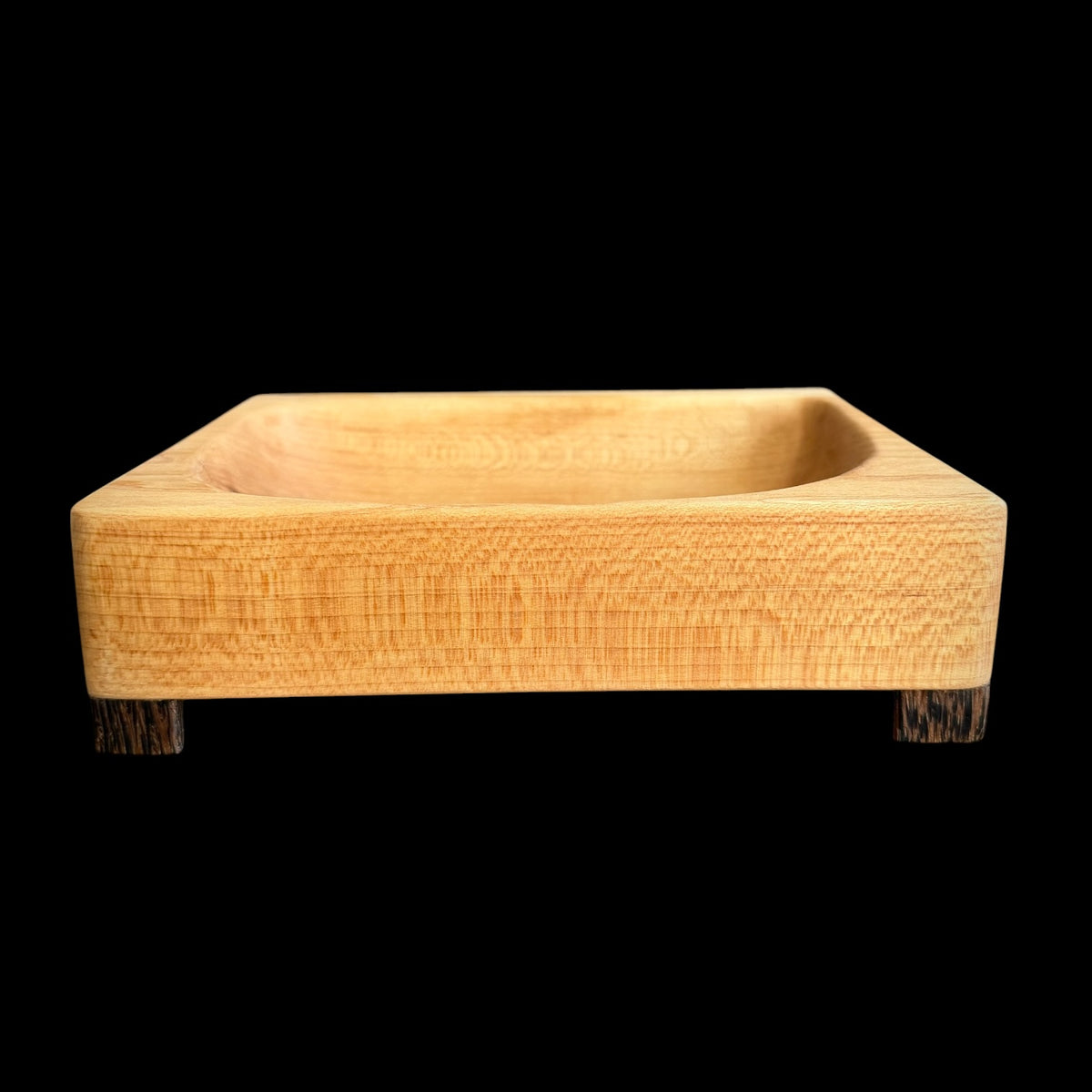 Hand-carved maple catch-all dish on dark black palm feet, 7.5 inches across, by Sawdust Heaven