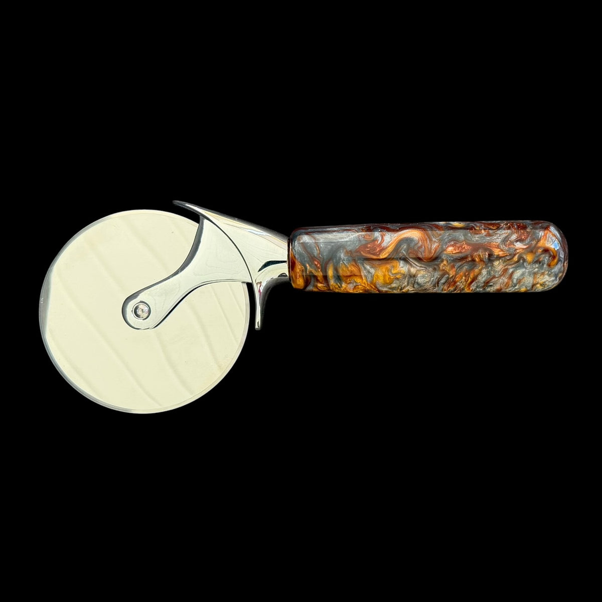 Second view of the Molten Lava pizza cutter and its heavy duty 4 inch blade