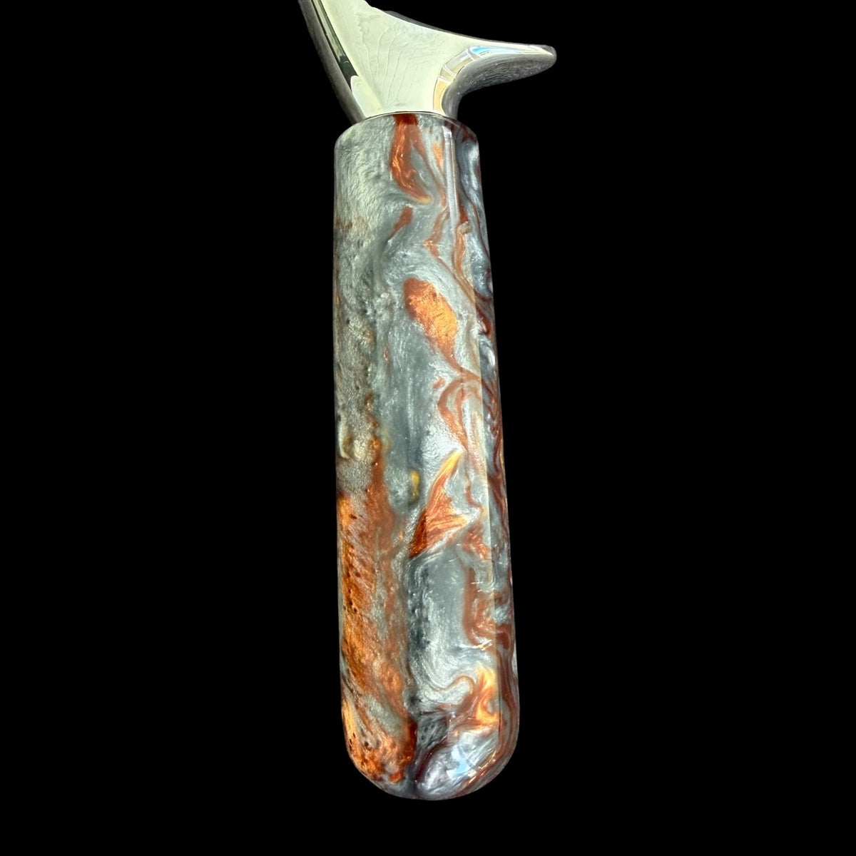 Fourth view of the Molten Lava acrylic pizza cutter handle from Sawdust Heaven