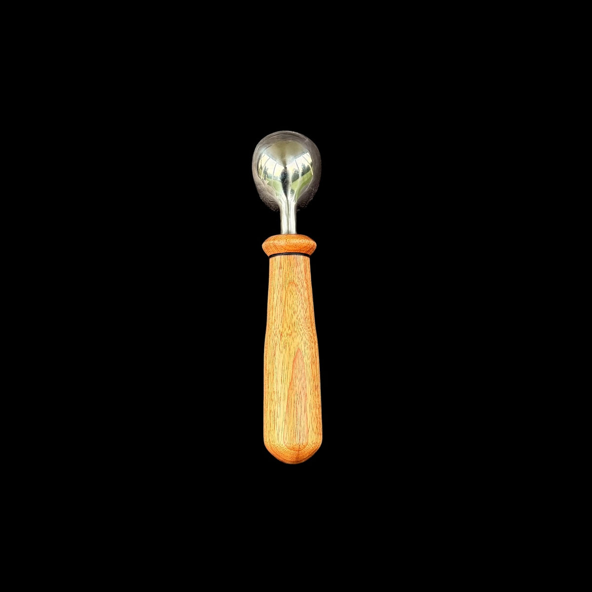 Third view of the macacuba scoop showing its striking natural markings