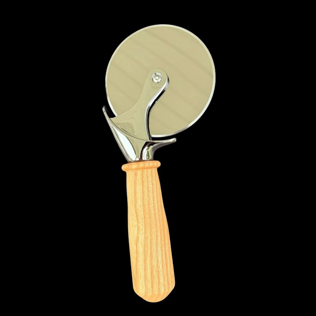 Second view of the Kentucky coffeetree pizza cutter showing its bold grain