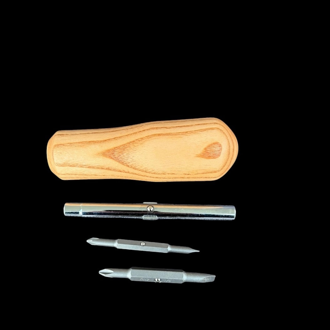 Third view of the screwdriver showing its two flathead and two phillips bits