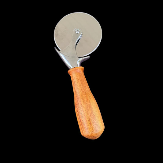 Pizza cutter with a hand-turned Red Canary wood handle in red and golden tones by Sawdust Heaven