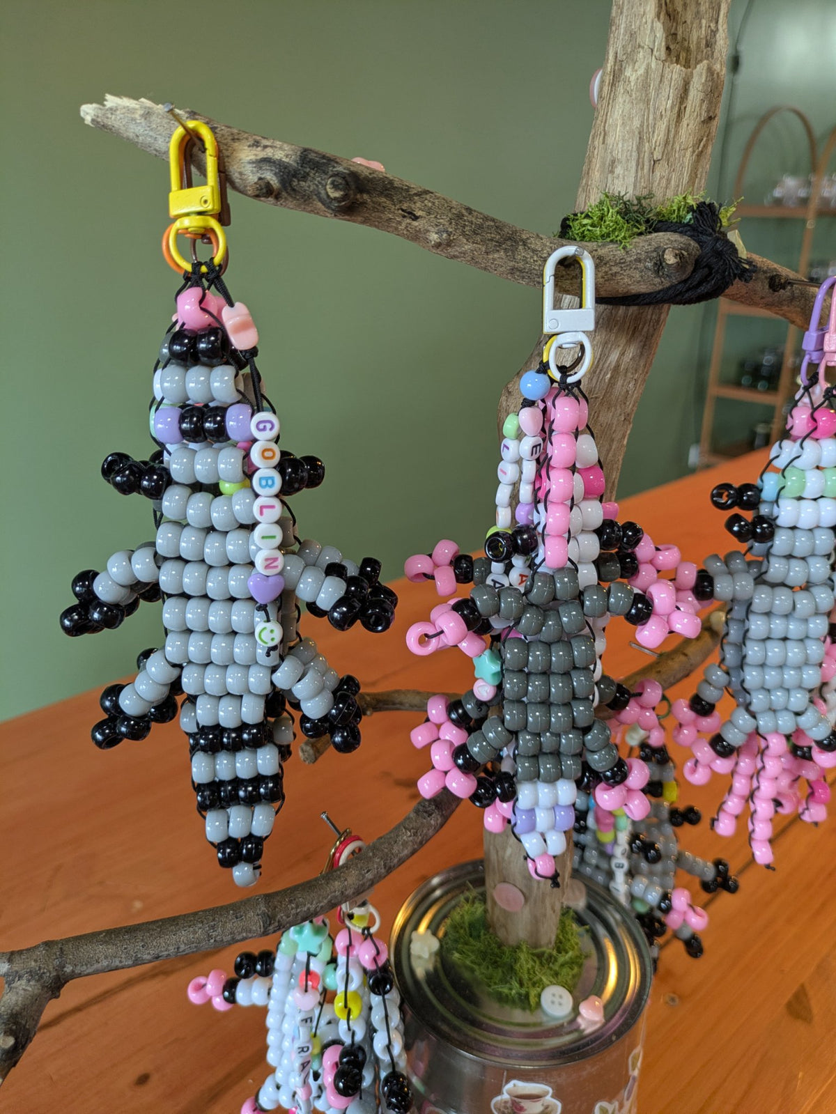 Feral critter keychain made from pony beads on nylon string with a clasp, by Jaimee Crash Art