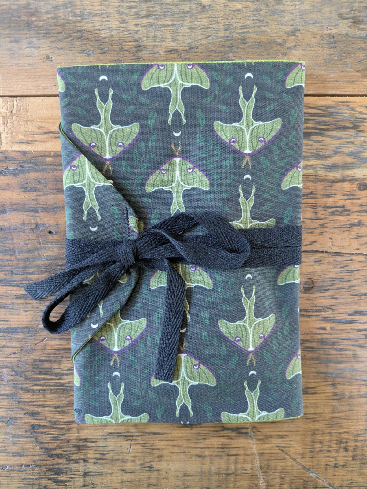 Cotton fabric card pouch in a printed pattern with cord tie, handmade by Jaimee Crash Art