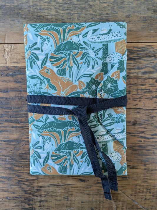 Printed cotton card pouch with matching lining and cotton cord closure by Jaimee Crash Art