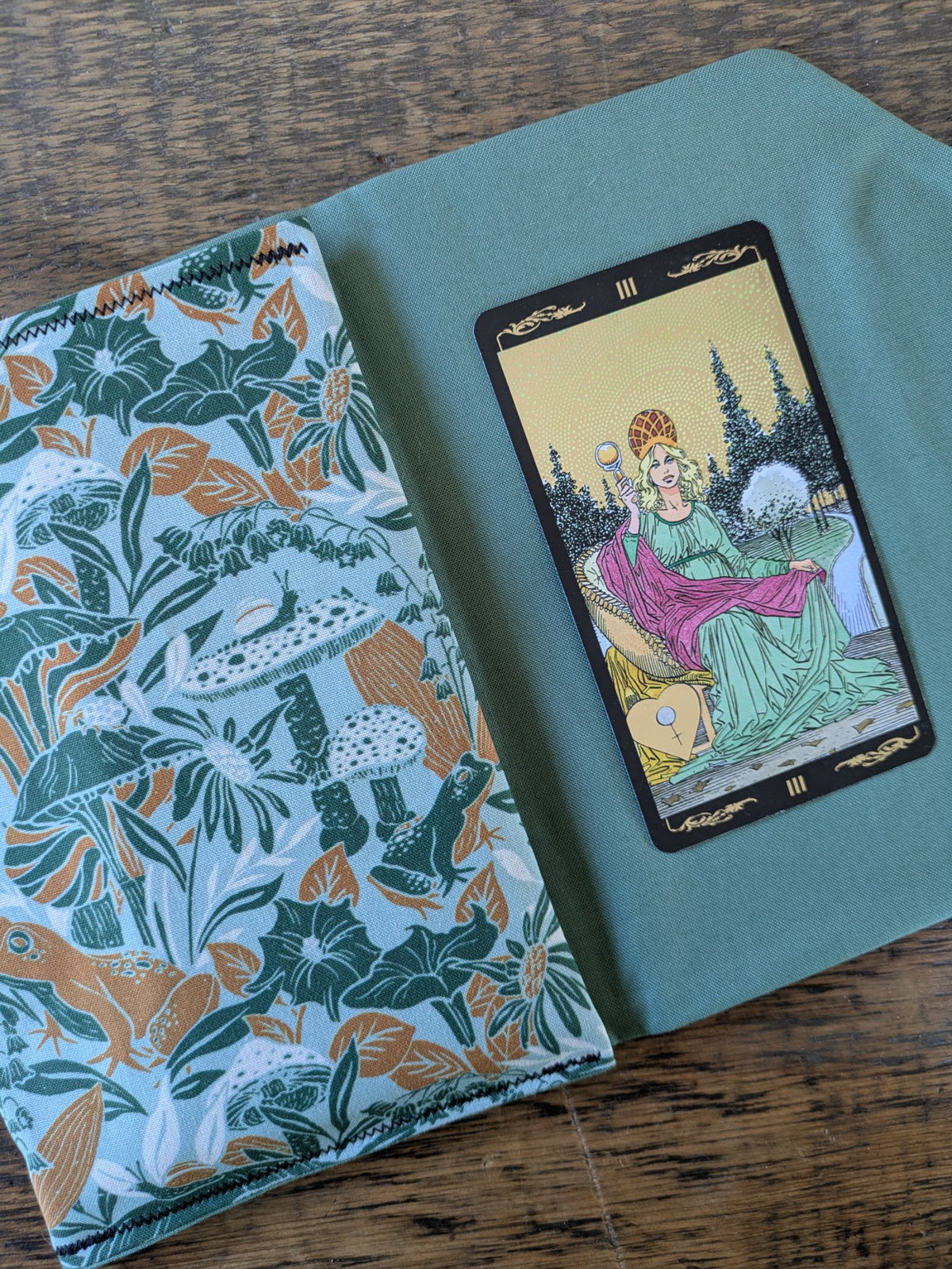 Second view of the card pouch showing the interior fabric and cord