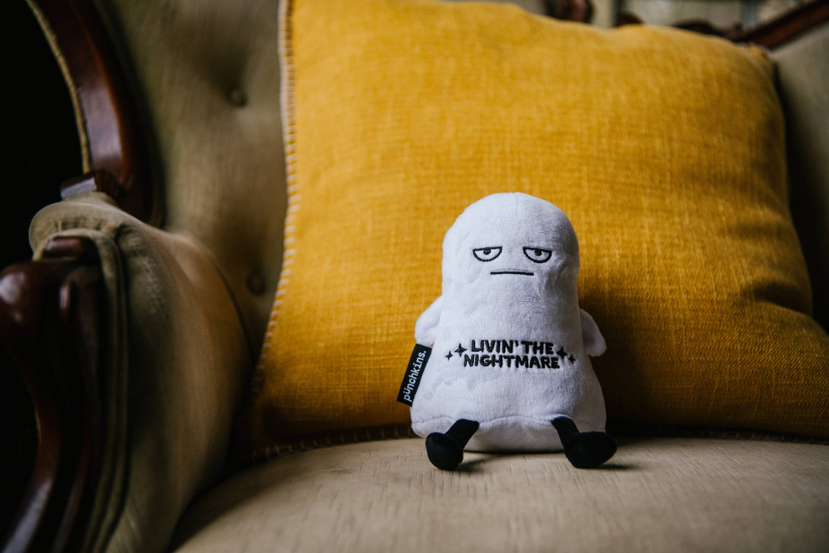 White ghost plush with bored expression and embroidered text Livin' The Nightmare by Punchkins, view 2
