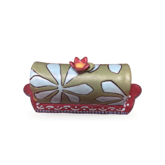 Handmade ceramic floral butter dish with green lid, white carved flowers, and red flower knob by ABeYOUtifulMind
