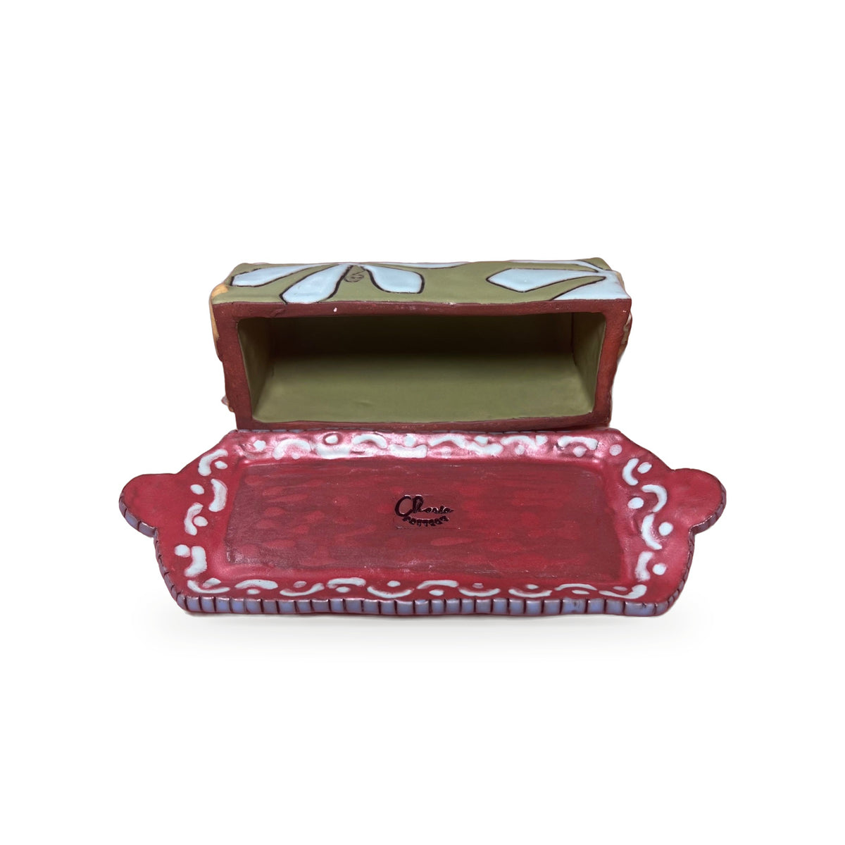 Floral butter dish with lid open showing red glazed tray with white painted border
