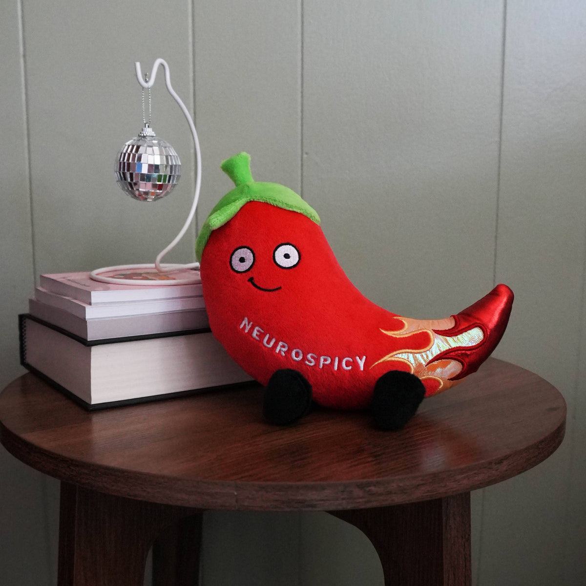 Red chili pepper plush with flame details and embroidered text Neurospicy by Punchkins, view 4