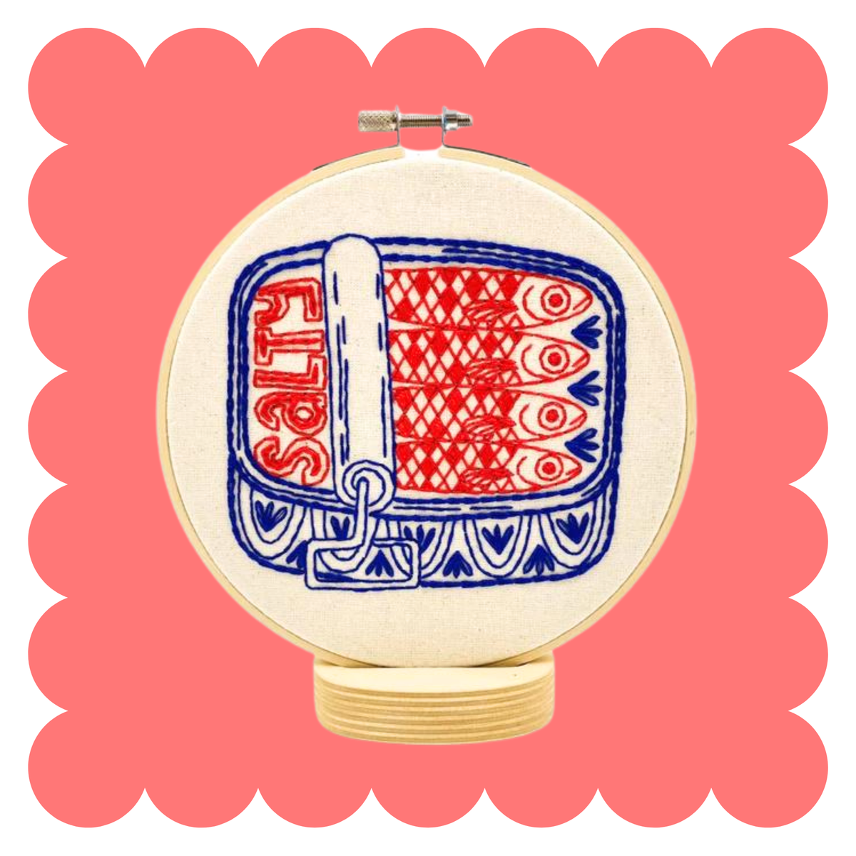 Embroidery hoop with stitched tin of sardines in blue and red