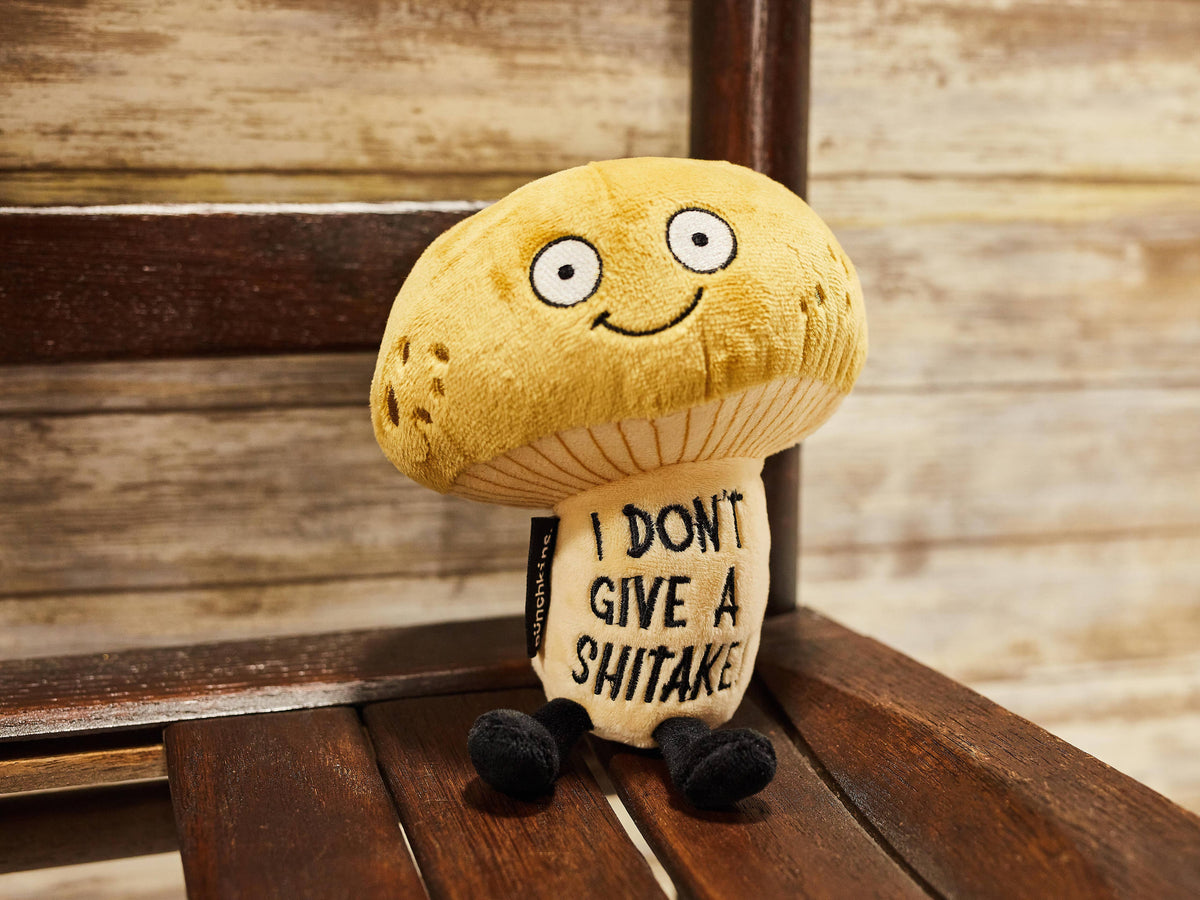 Brown mushroom plush with embroidered text I Don't Give A Shitake by Punchkins, view 2