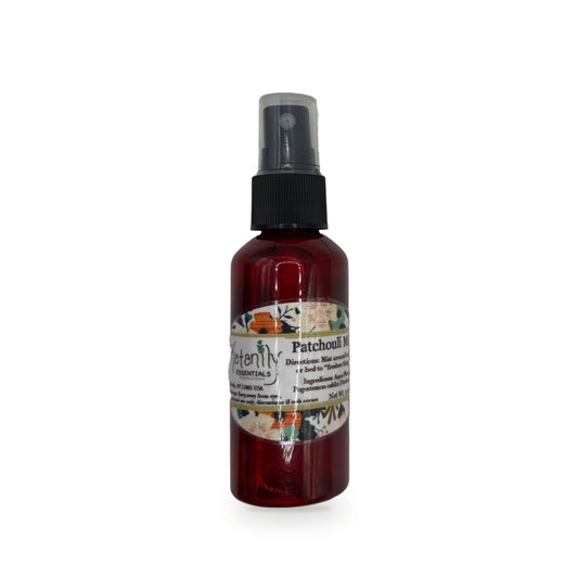 Patchouli Mist 2 oz red glass spray bottle with floral label by Katanily Essentials
