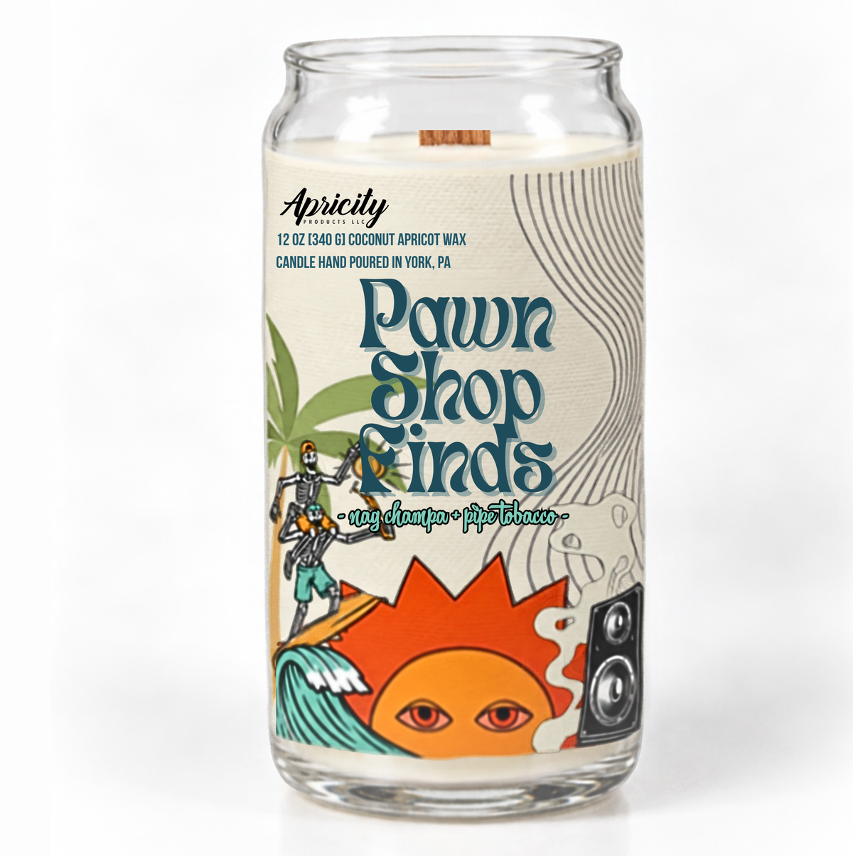 Pawn Shop Finds nag champa and pipe tobacco candle in a clear glass can jar with a wooden wick